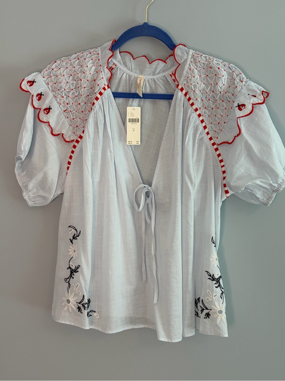 NWT Anthropologie Light Blue Peasant Blouse with Red Trim